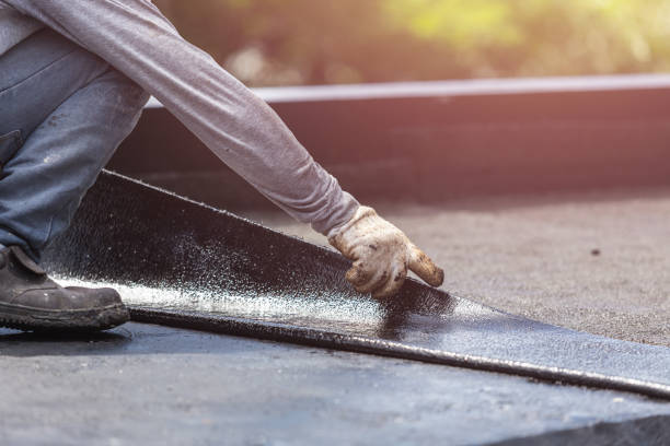 Professional Basement Waterproofing technician working in Clayton, GA